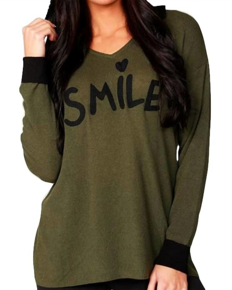 Front of a model wearing a size LG Smile Hoodie in Moss/Black in Moss/Black by ANGEL. | dia_product_style_image_id:326785